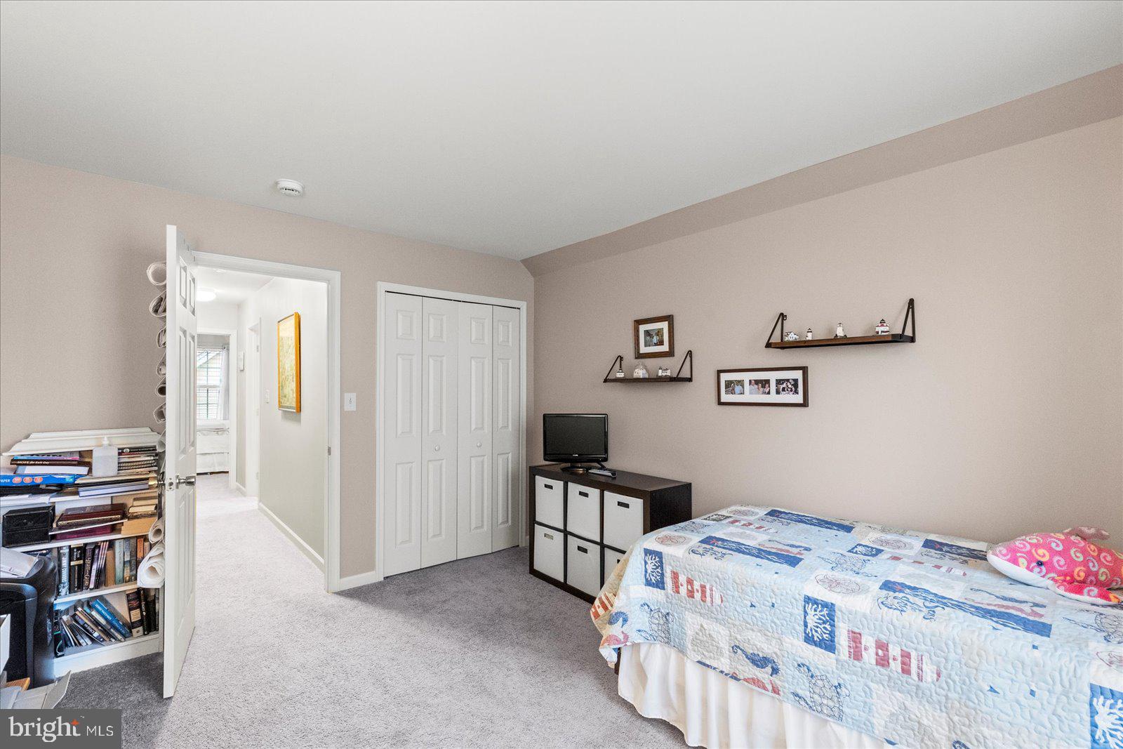 555 Countryside Road Seven Valleys, PA 17360 - Photo 29 of 56 a bedroom with a bed and furniture