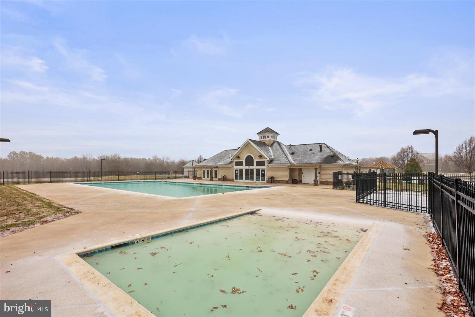 555 Countryside Road Seven Valleys, PA 17360 - Photo 47 of 56 a view of a lake with a big yard and large trees