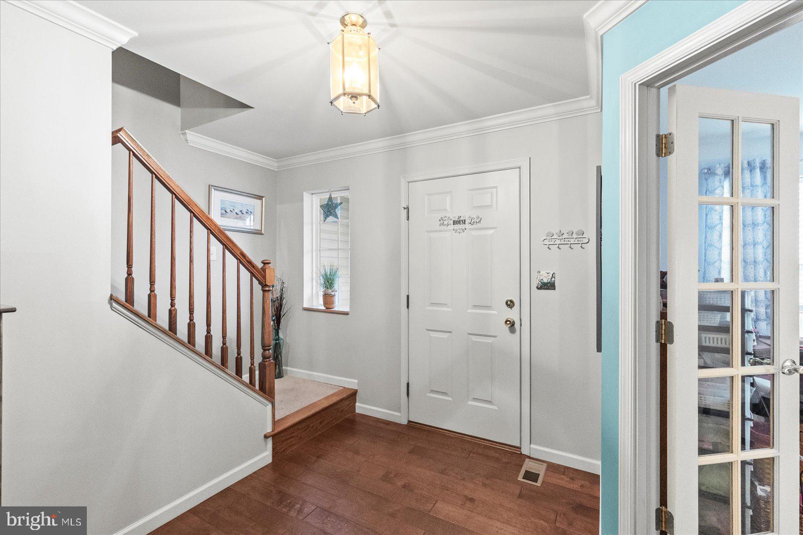 555 Countryside Road Seven Valleys, PA 17360 - Photo 6 of 56 a view of a hallway with entryway and hardwood floor