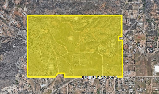 24007 Juniper Flats Road Homeland, CA 92548 - Photo 2 of 5 a bathroom with a blue wall