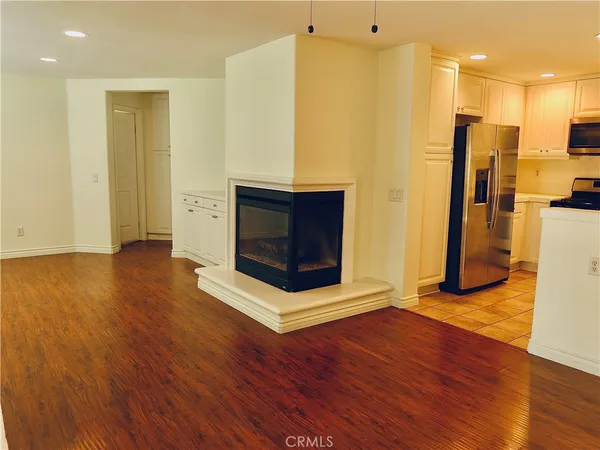 a spacious bathroom with a double vanity sink and a mirror