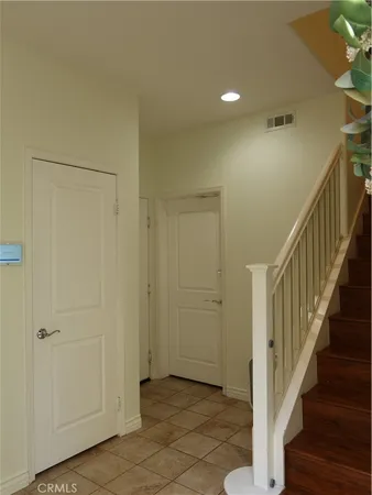 a view of entryway with a front door