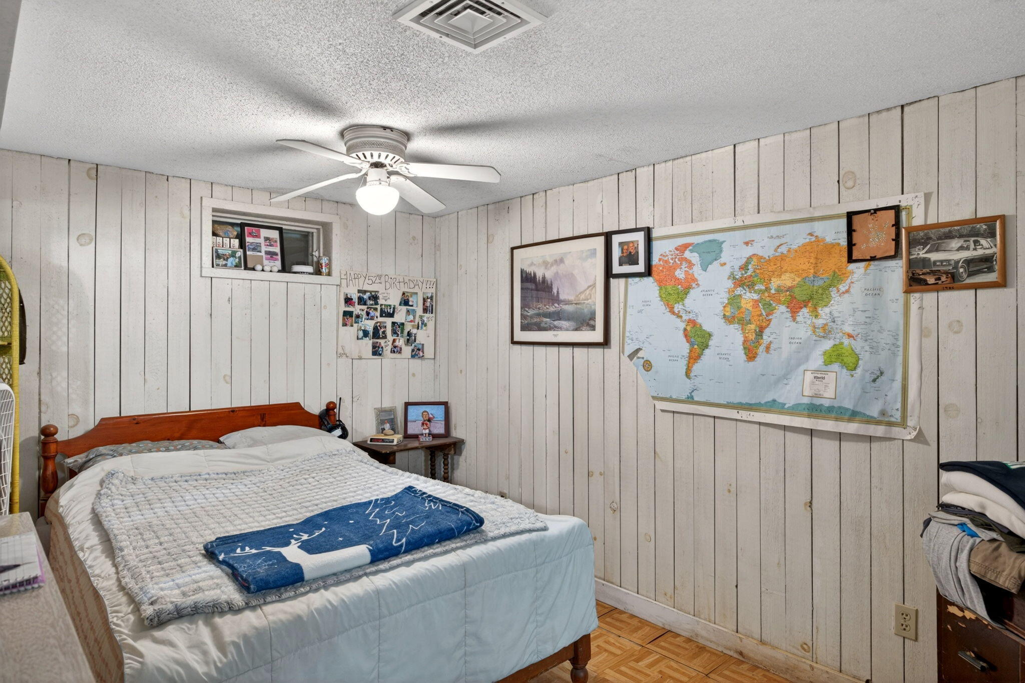 73 County Road Bourne, MA 02532 - Photo 41 of 91 a bedroom with a bed and a painting on the wall