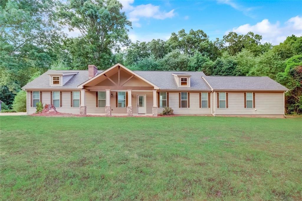 5057 Waterworks Road Jefferson, GA 30549 - Photo 1 of 1 a view of a house with a yard