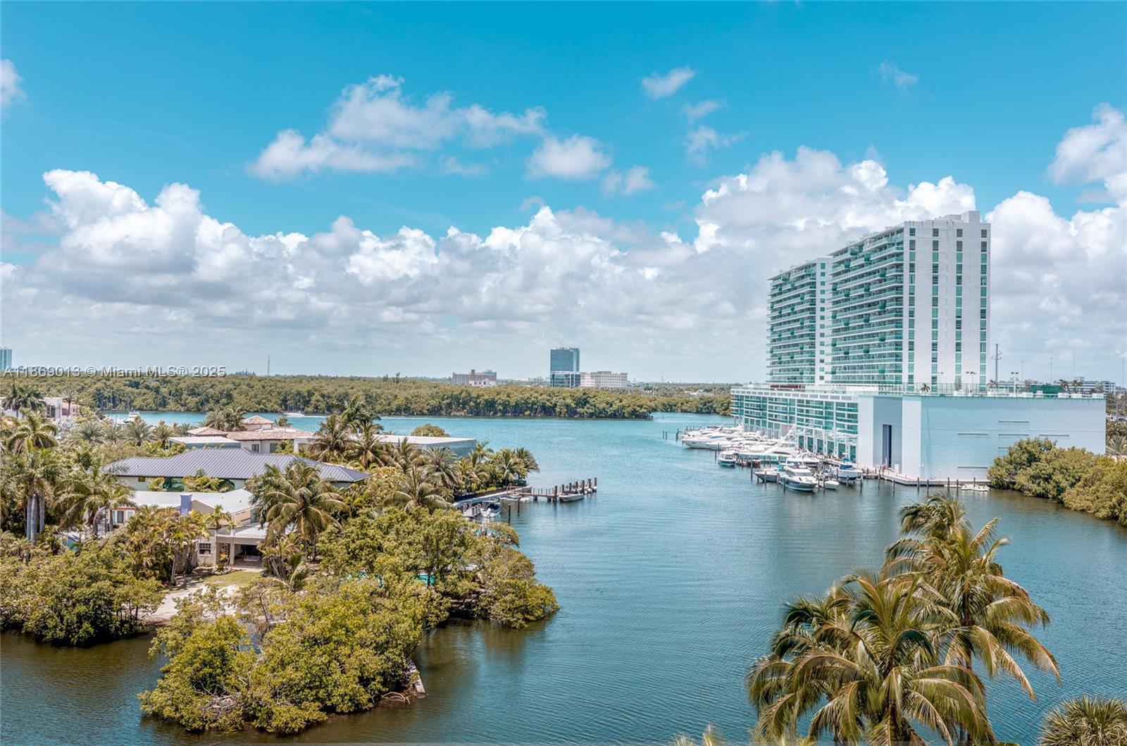 16500 Collins Avenue, Unit 655 Sunny Isles Beach, FL 33160 - Photo 23 of 48 a view of a lake with a city