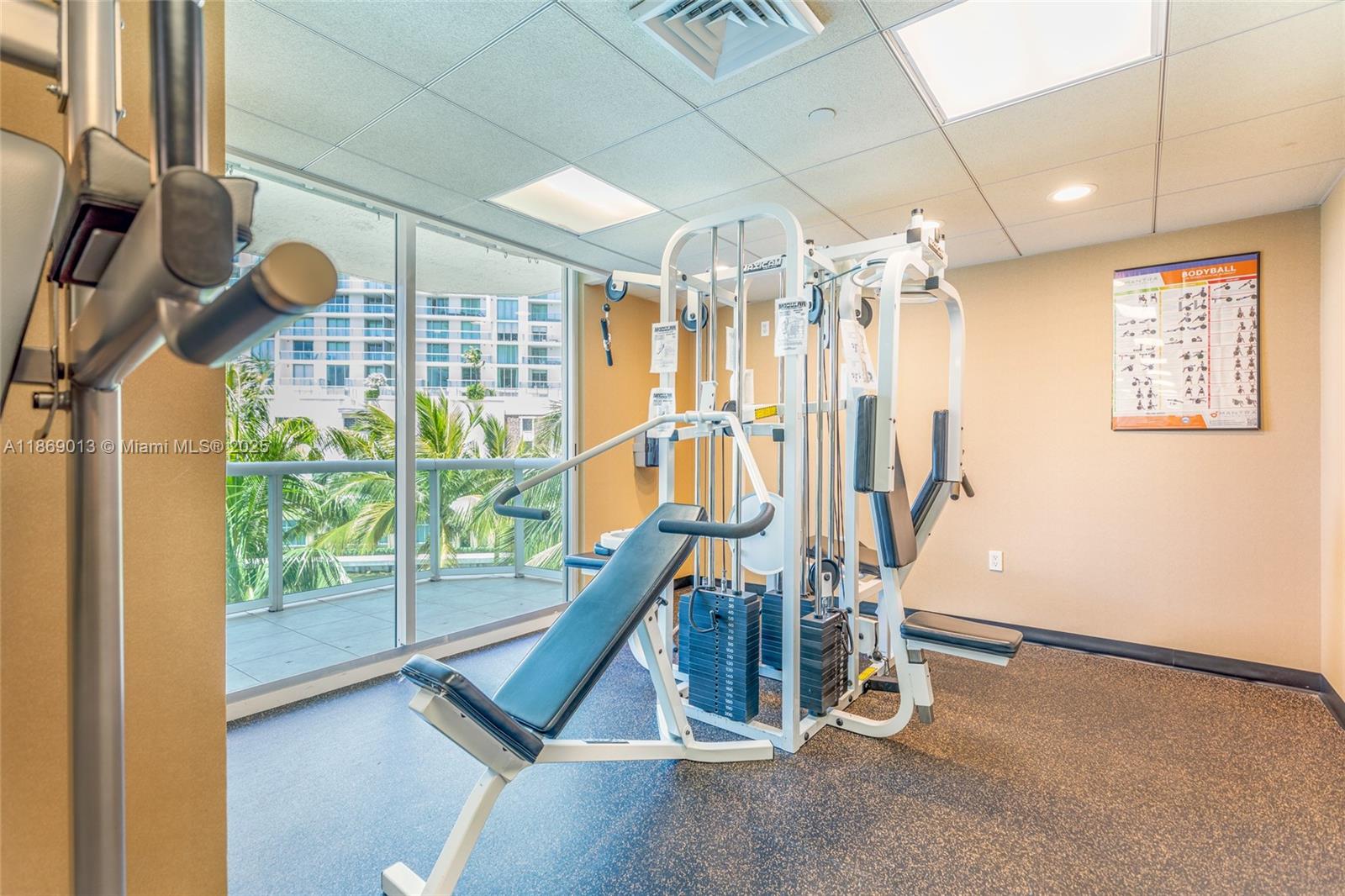 16500 Collins Avenue, Unit 655 Sunny Isles Beach, FL 33160 - Photo 39 of 48 a view of a room with gym equipment
