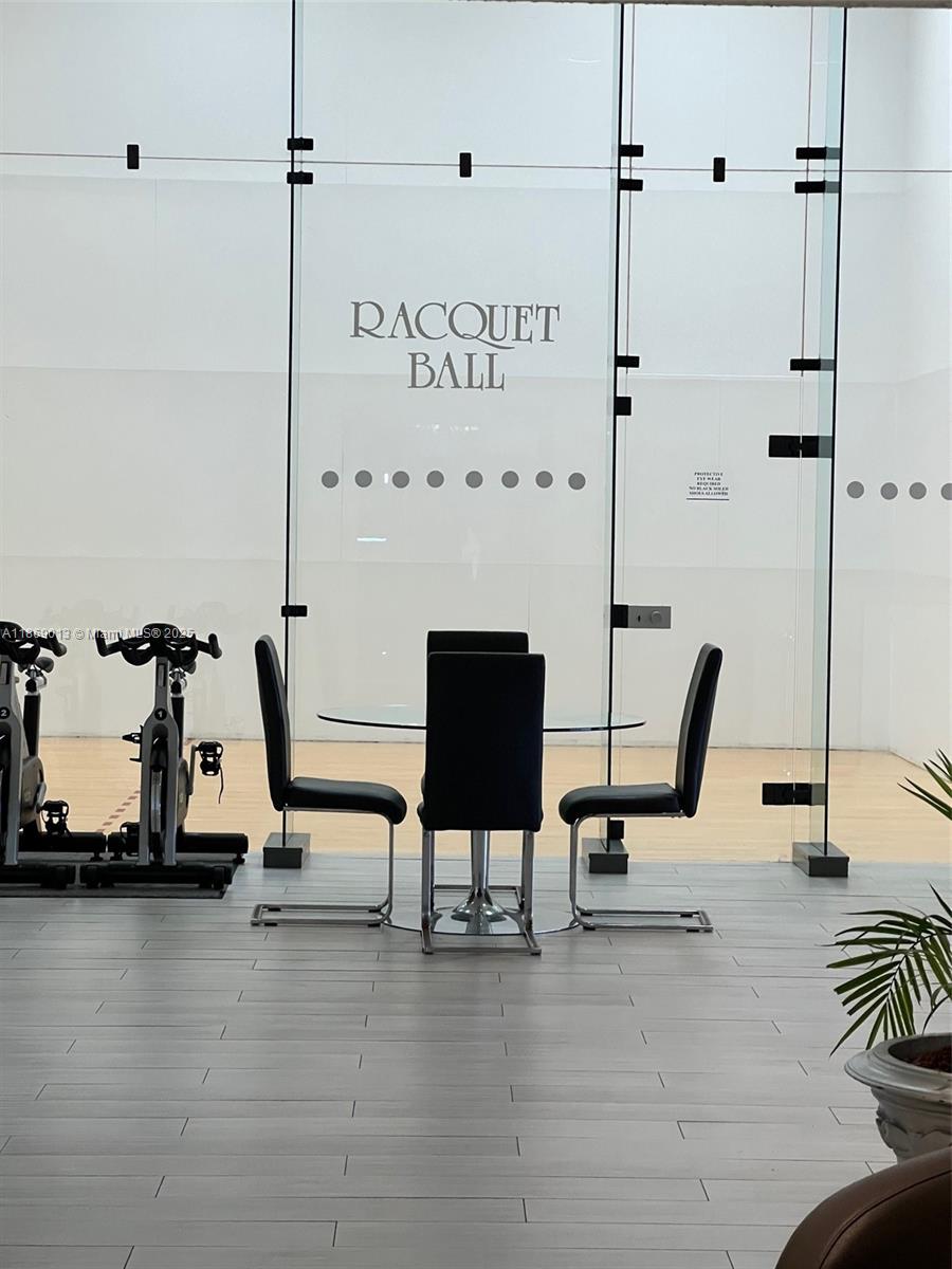 16500 Collins Avenue, Unit 655 Sunny Isles Beach, FL 33160 - Photo 42 of 48 a view of a workspace with furniture