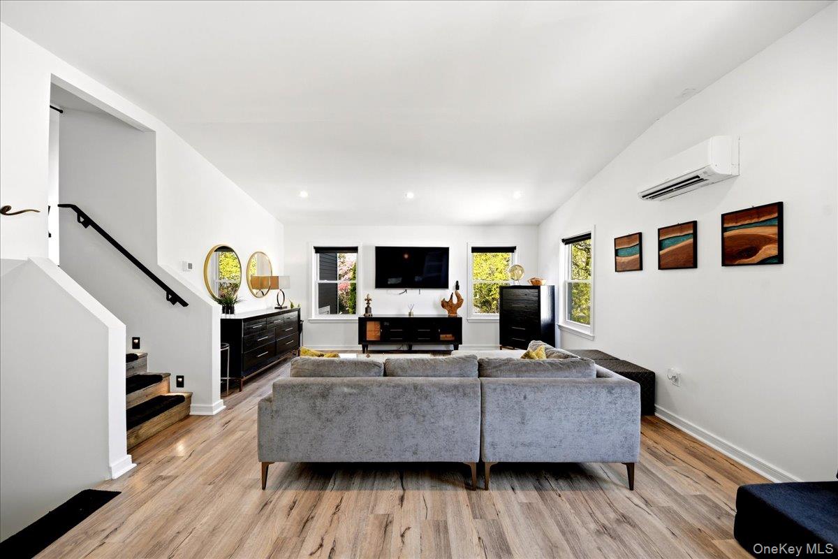 93 Fordham Street Bronx, NY 10464 - Photo 12 of 41 a living room with furniture and a flat screen tv