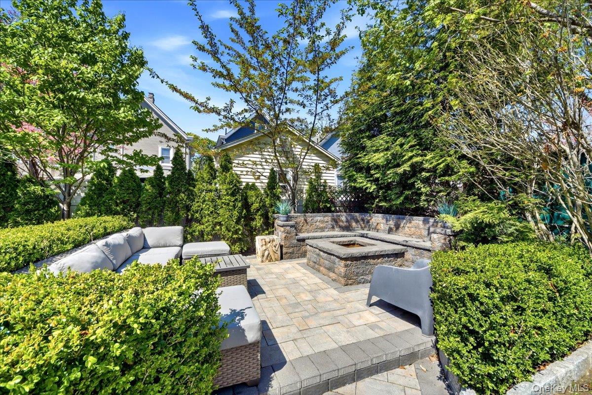 93 Fordham Street Bronx, NY 10464 - Photo 3 of 41 a view of a patio with table and chairs and potted plants