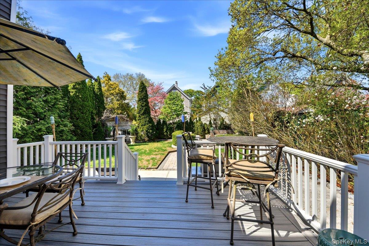 93 Fordham Street Bronx, NY 10464 - Photo 7 of 41 a view of a chairs and table on the deck