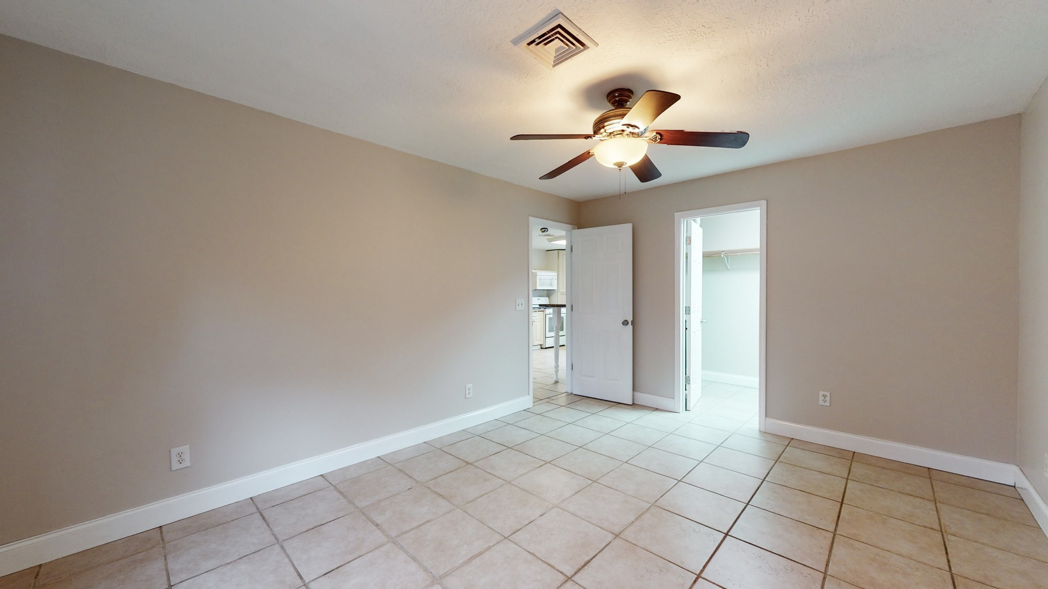 1425 India Road Paris, TN 38242 - Photo 14 of 18 wooden floor in an empty room with a window