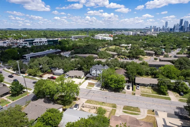 an aerial view of a city with lots of residential buildings