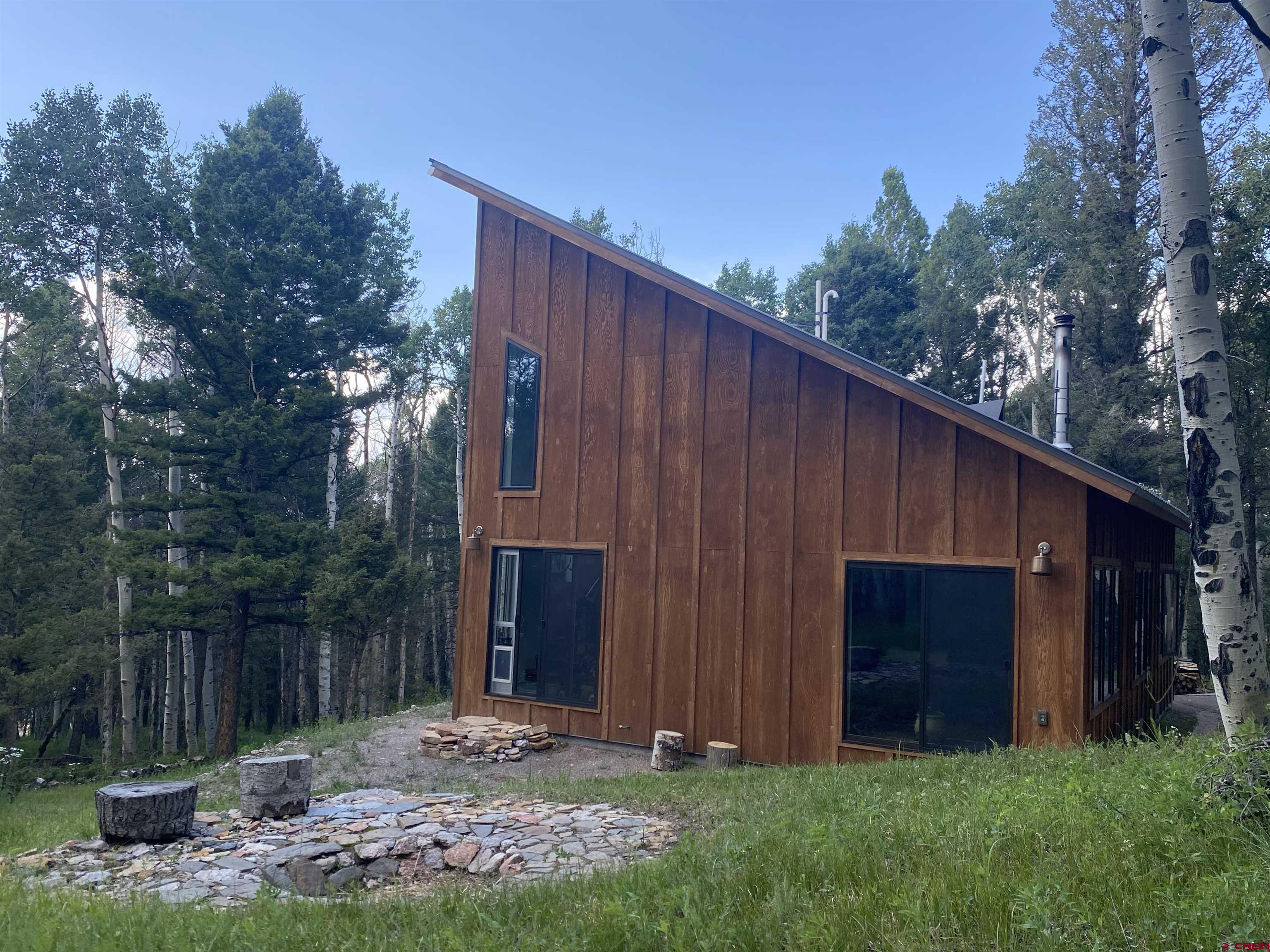 593 Crest Drive Cimarron, CO 81220 - Photo 18 of 30 a view of a back yard of the house