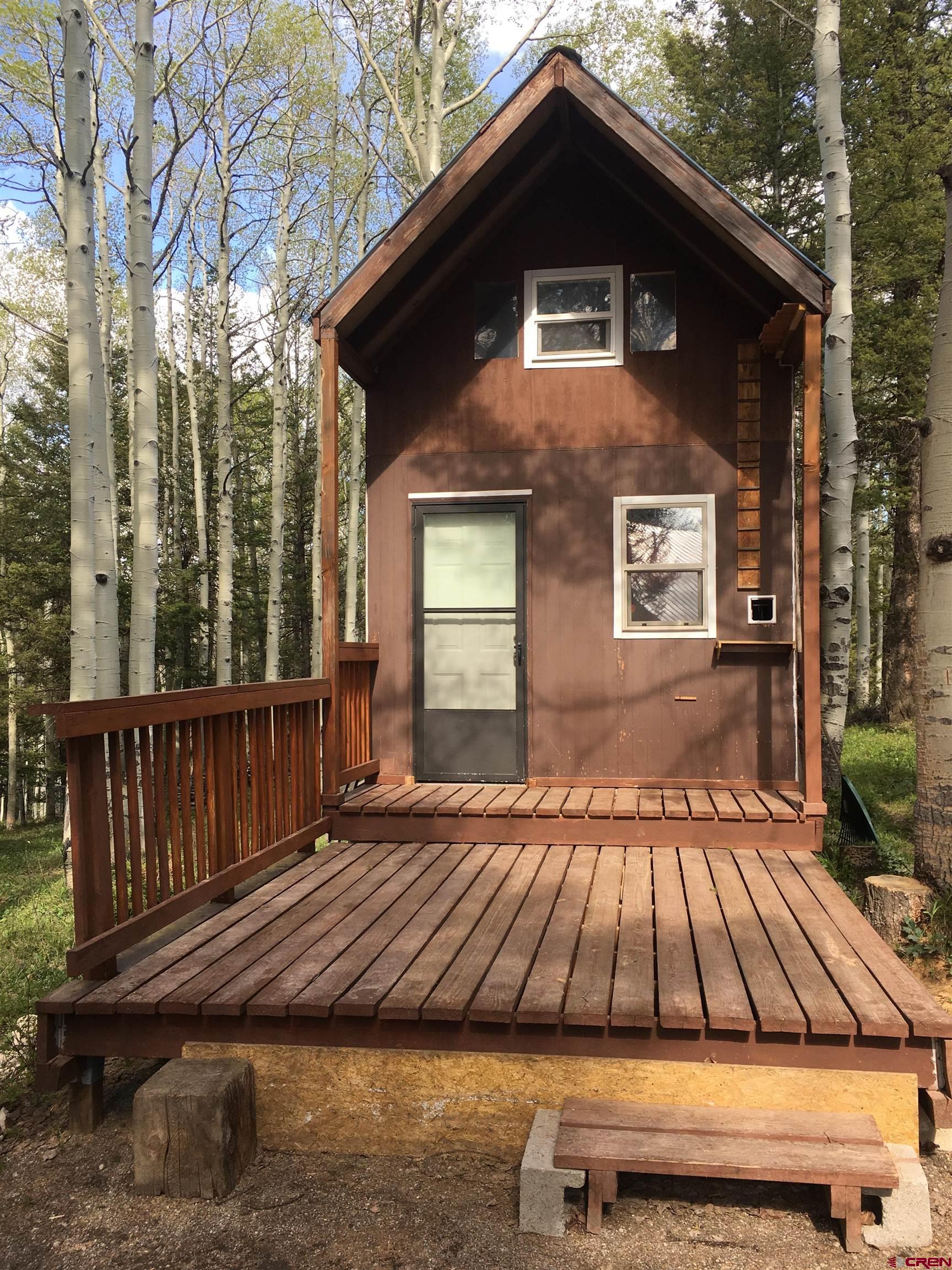 593 Crest Drive Cimarron, CO 81220 - Photo 24 of 30 a front view of house with yard