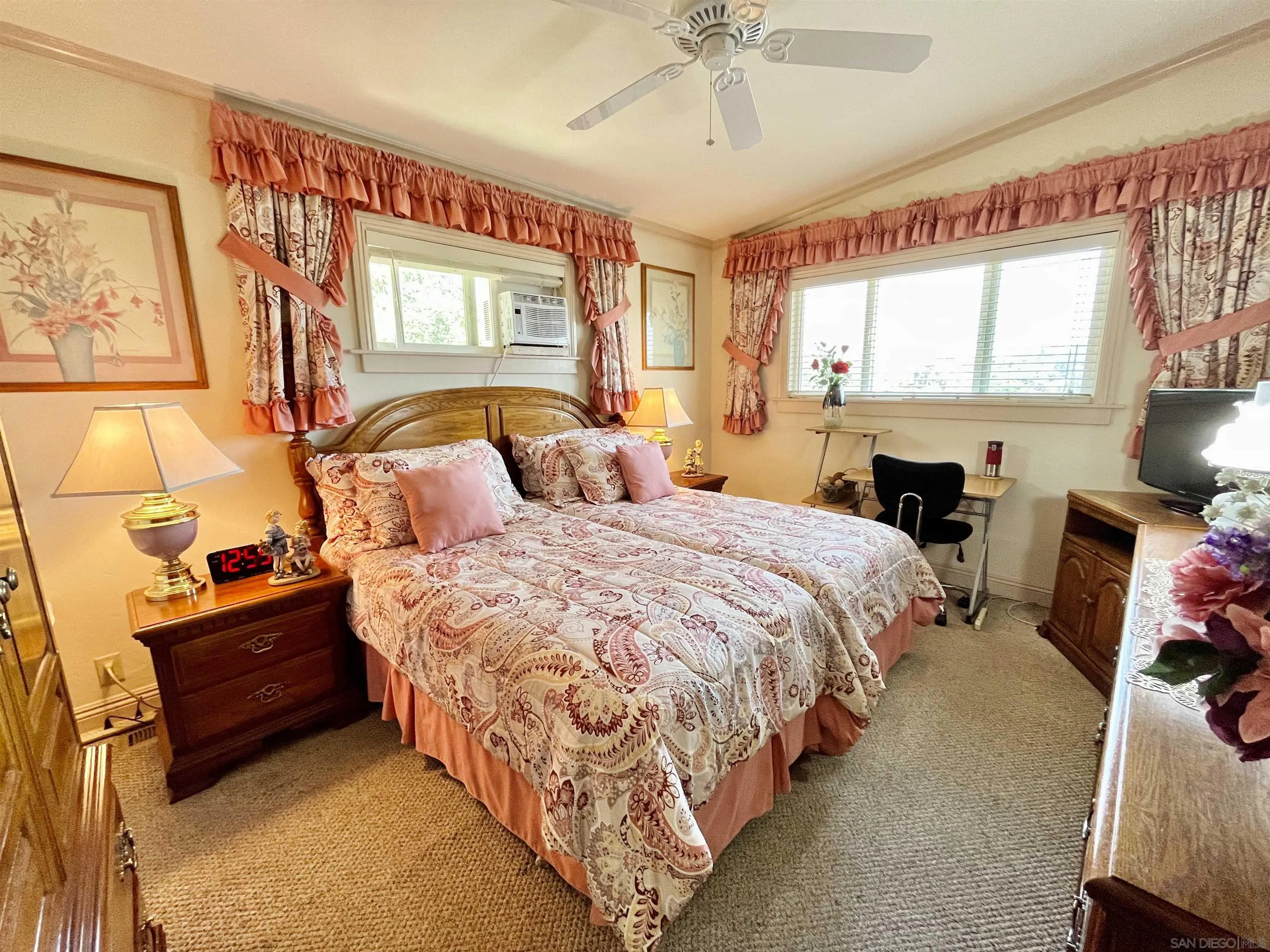 8844 Golf Drive Spring Valley, CA 91977 - Photo 18 of 56 a bedroom with bed and window