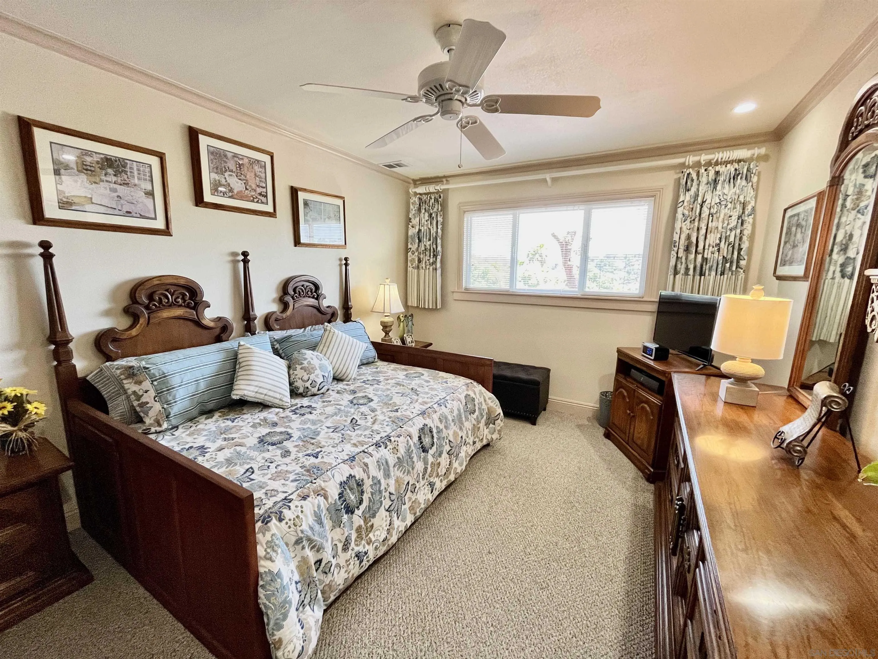 8844 Golf Drive Spring Valley, CA 91977 - Photo 19 of 56 a bedroom with a bed and furniture