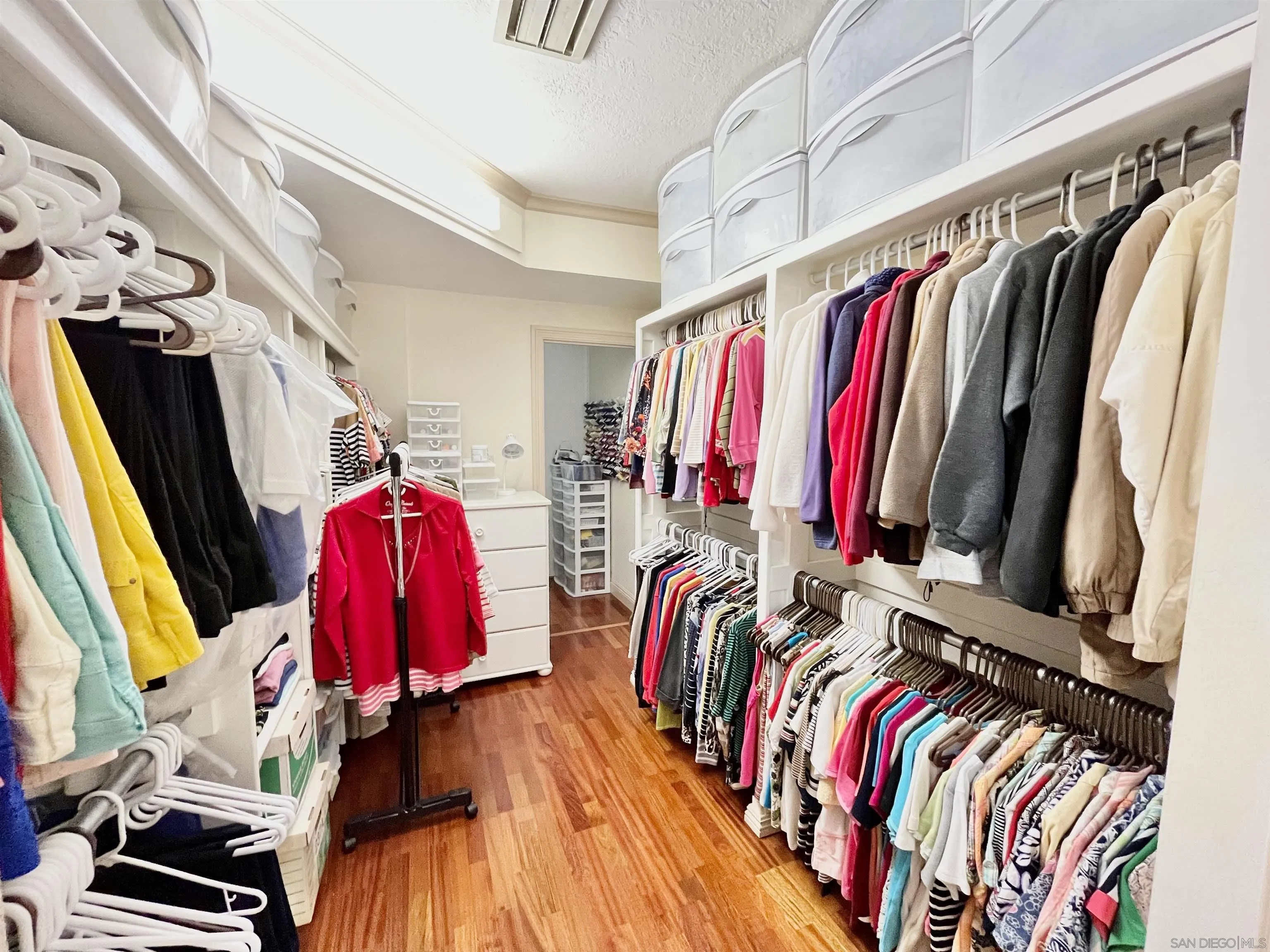 8844 Golf Drive Spring Valley, CA 91977 - Photo 25 of 56 a view of walk in closet with clothes