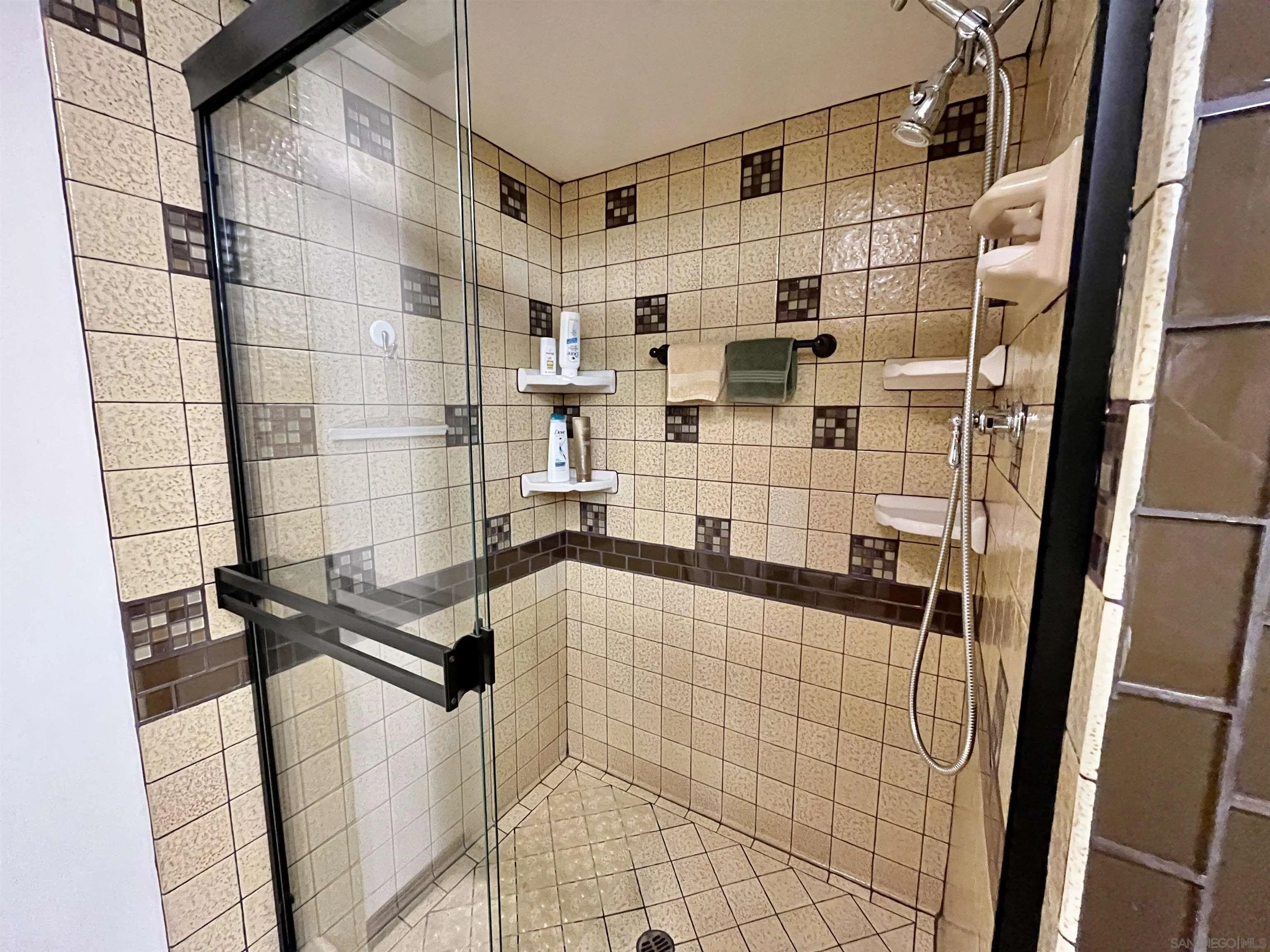 8844 Golf Drive Spring Valley, CA 91977 - Photo 29 of 56 a bathroom with a shower and a sink