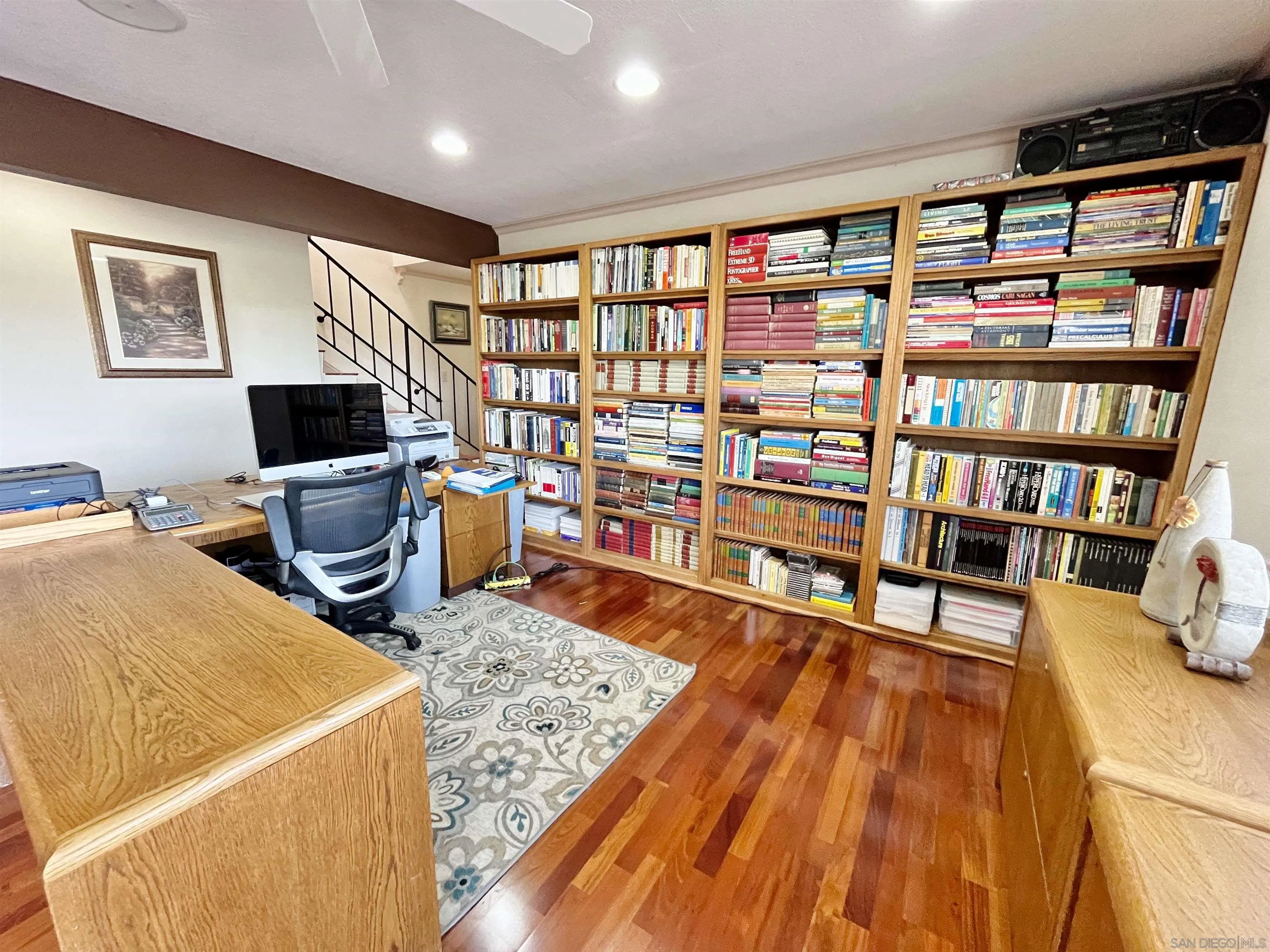 8844 Golf Drive Spring Valley, CA 91977 - Photo 33 of 56 a living room with hard wood floors and a flat screen tv