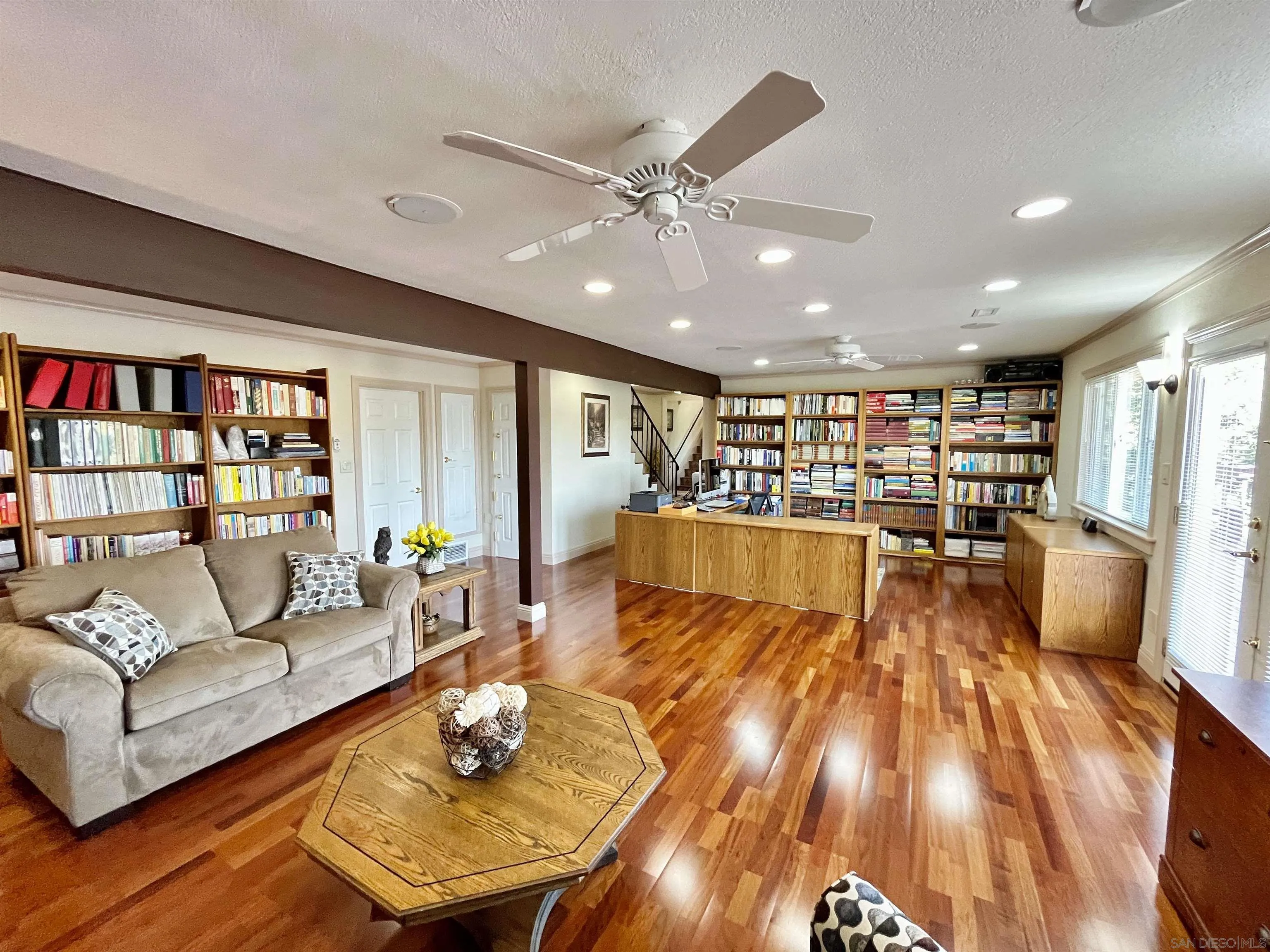 8844 Golf Drive Spring Valley, CA 91977 - Photo 37 of 56 a living room with furniture and a wooden floor