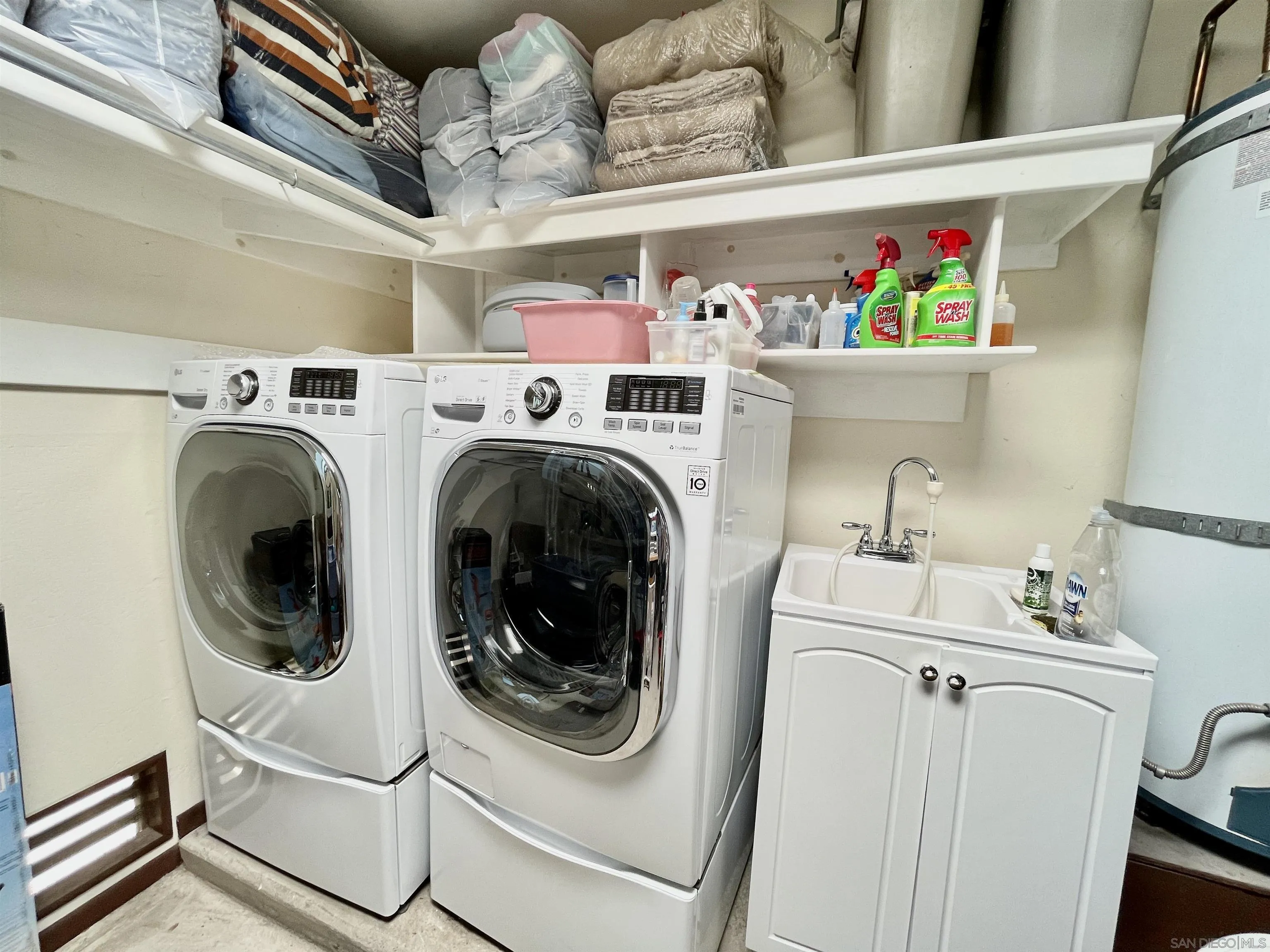 8844 Golf Drive Spring Valley, CA 91977 - Photo 40 of 56 a utility room with dryer and washer