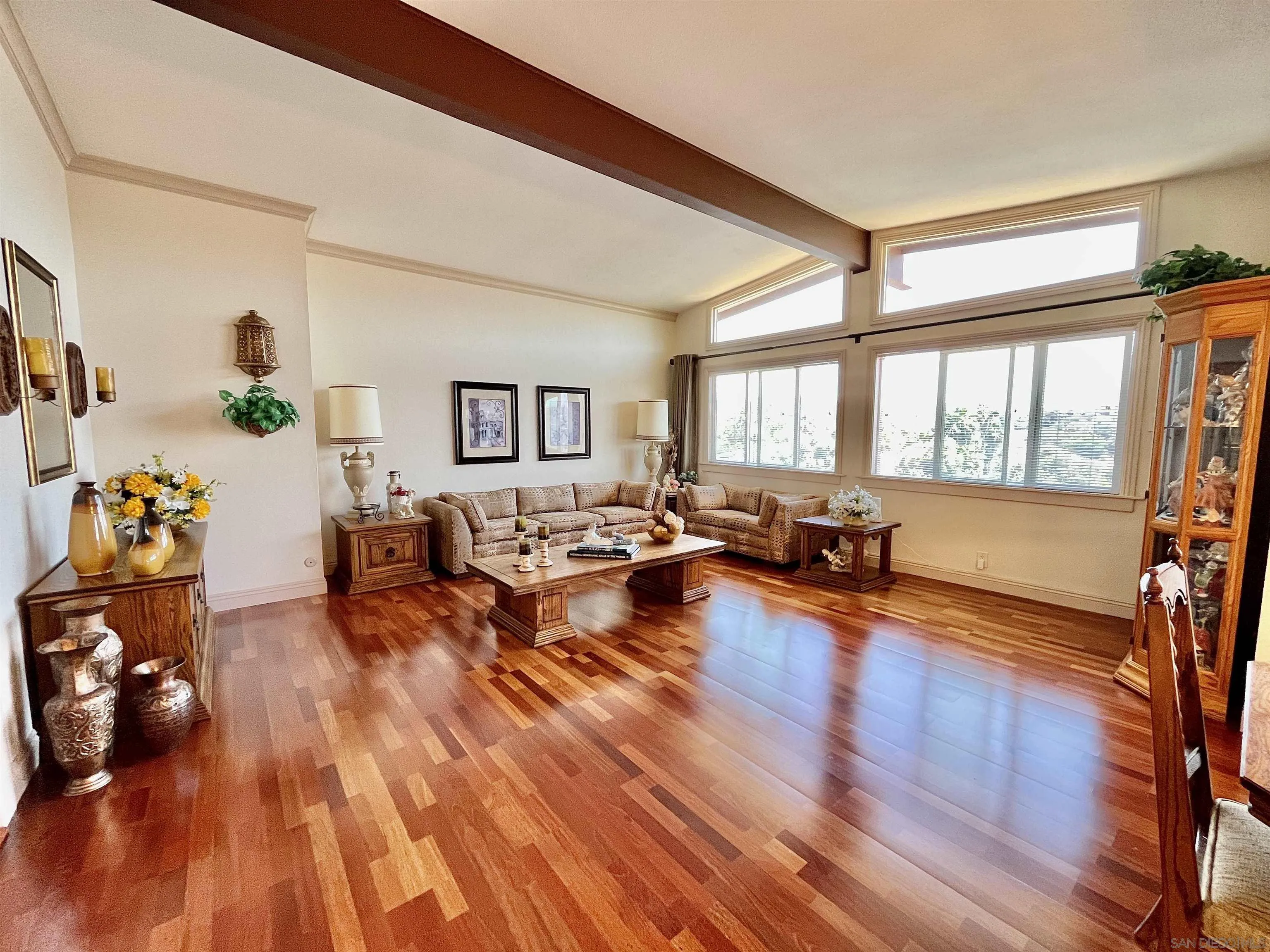 8844 Golf Drive Spring Valley, CA 91977 - Photo 4 of 56 a living room with furniture and a wooden floor