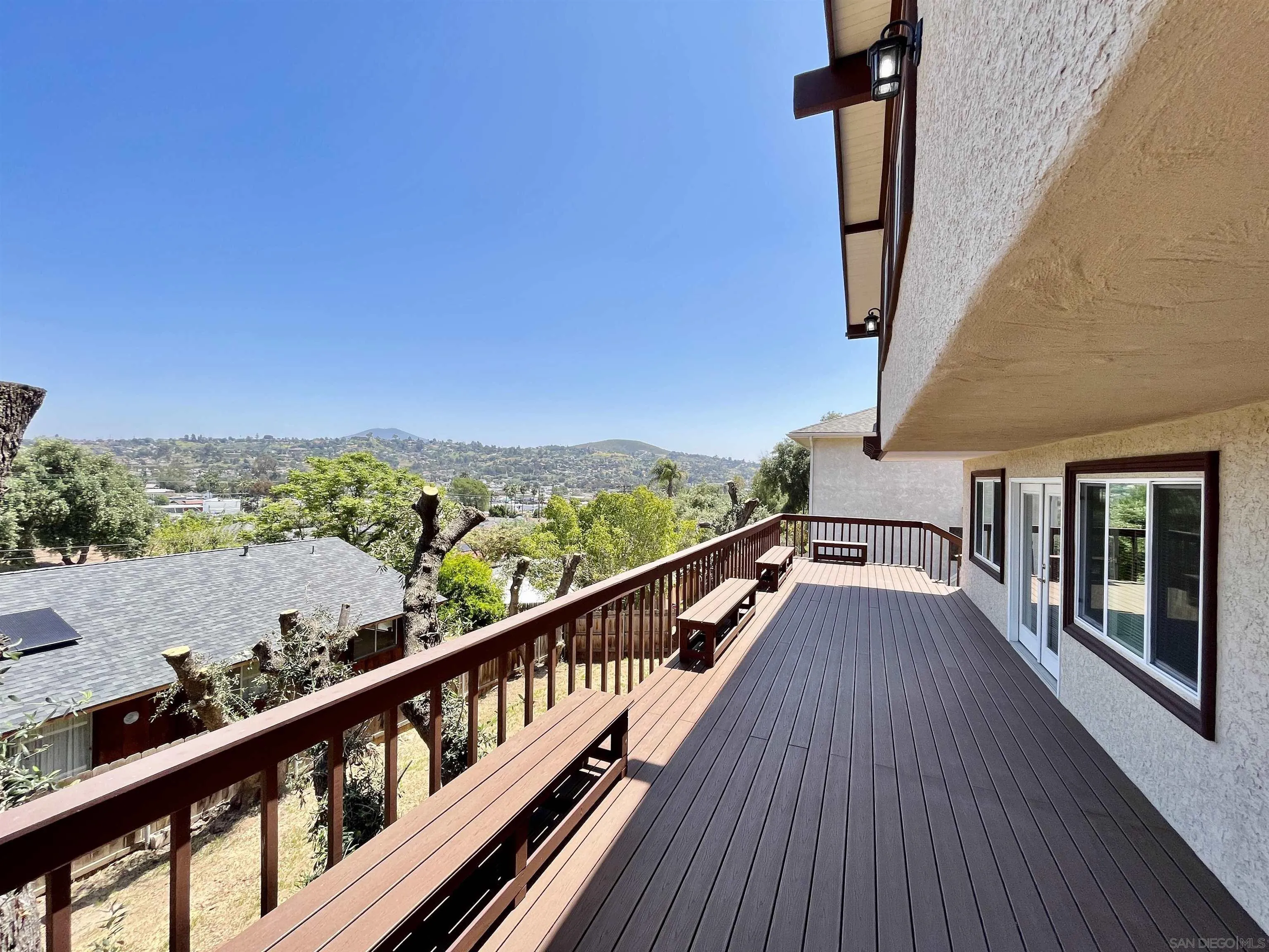 8844 Golf Drive Spring Valley, CA 91977 - Photo 45 of 56 a view of balcony with wooden floor and fence