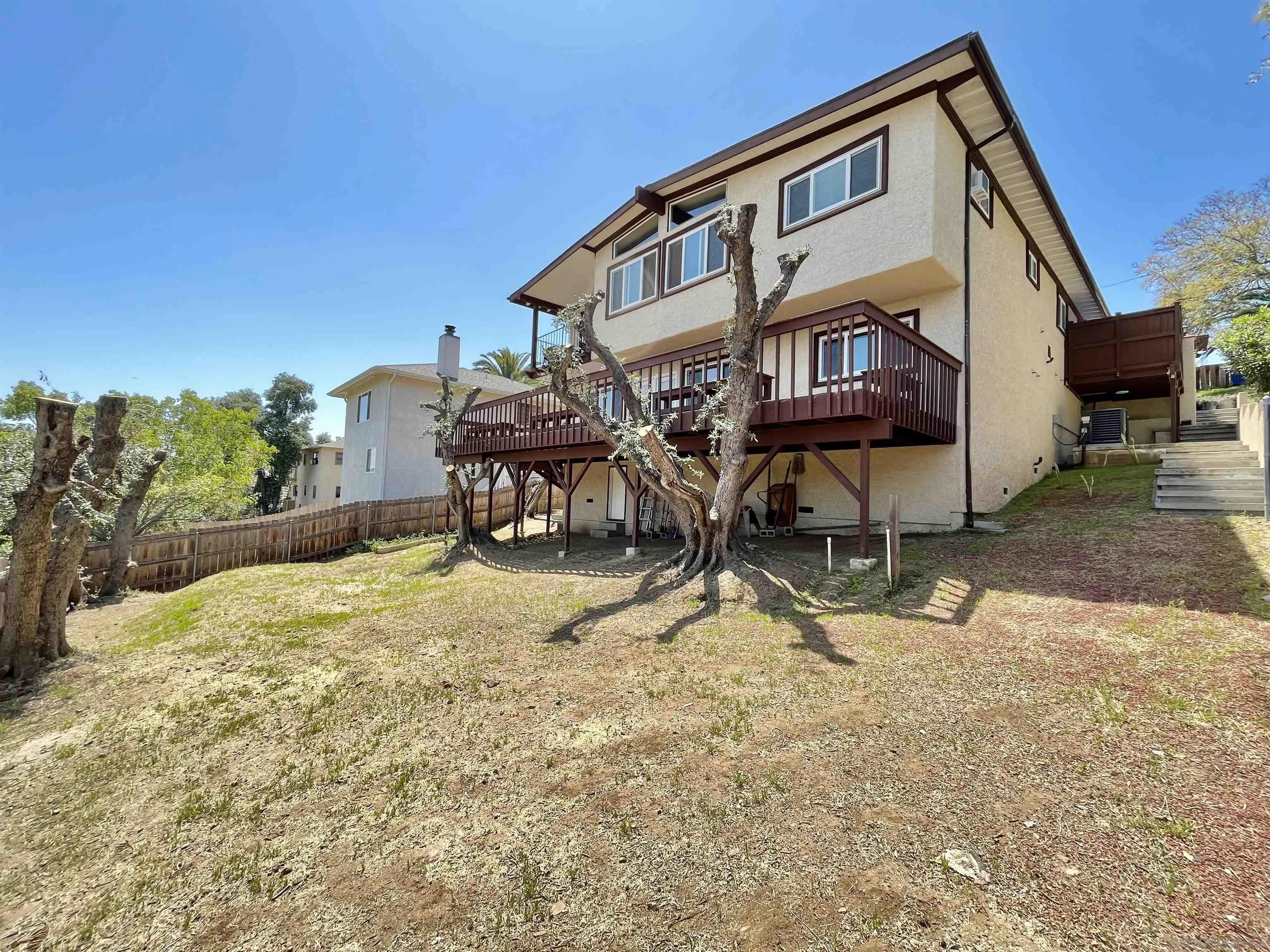 8844 Golf Drive Spring Valley, CA 91977 - Photo 48 of 56 a view of an house with backyard porch and sitting area