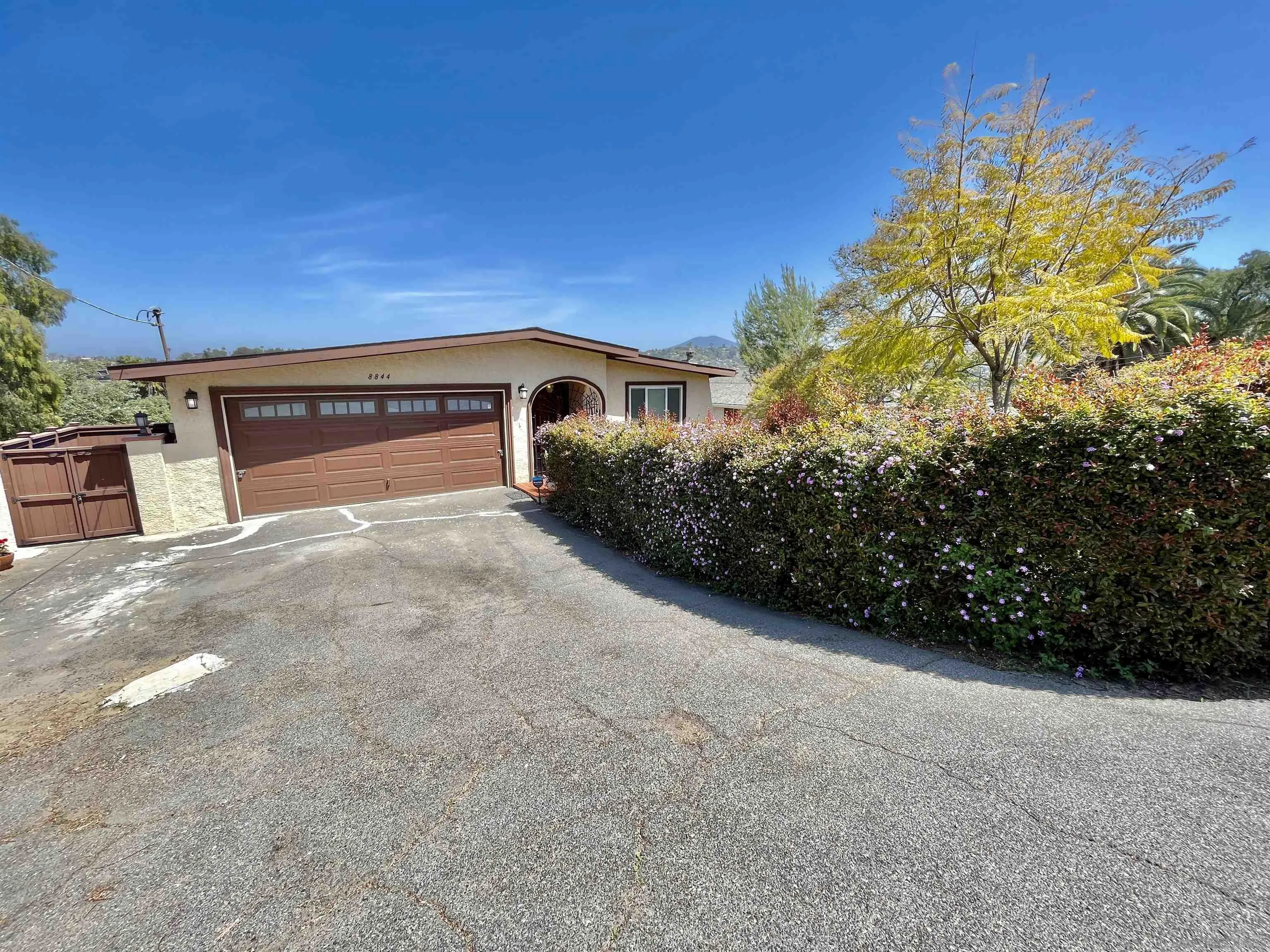 8844 Golf Drive Spring Valley, CA 91977 - Photo 53 of 56 a view of a big room with potted plants