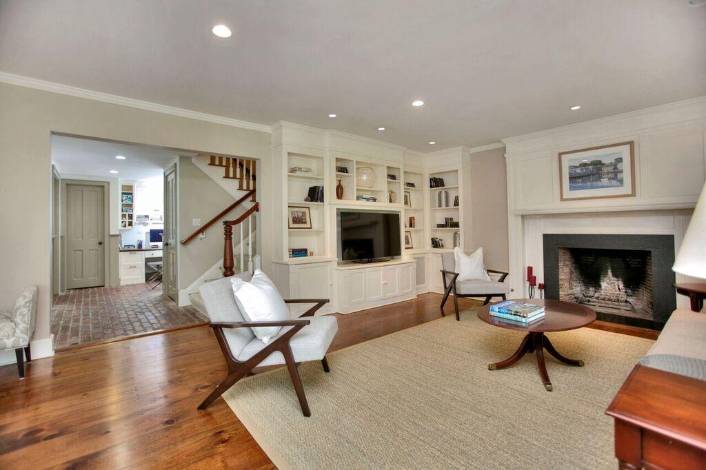 45 Ridge Acres Road Darien, CT 06820 - Photo 11 of 25 a living room with furniture and a fireplace