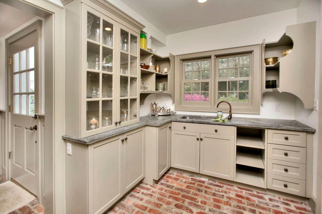 45 Ridge Acres Road Darien, CT 06820 - Photo 12 of 25 a kitchen with granite countertop a sink and a stove