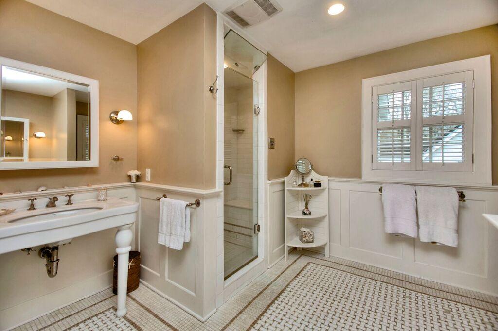 45 Ridge Acres Road Darien, CT 06820 - Photo 16 of 25 a bathroom with a sink a toilet and mirror