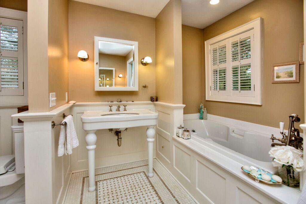45 Ridge Acres Road Darien, CT 06820 - Photo 17 of 25 a bathroom with a sink double vanity and a tub