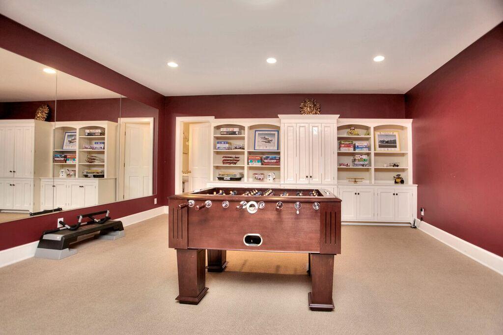 45 Ridge Acres Road Darien, CT 06820 - Photo 20 of 25 a room with furniture pool table and windows