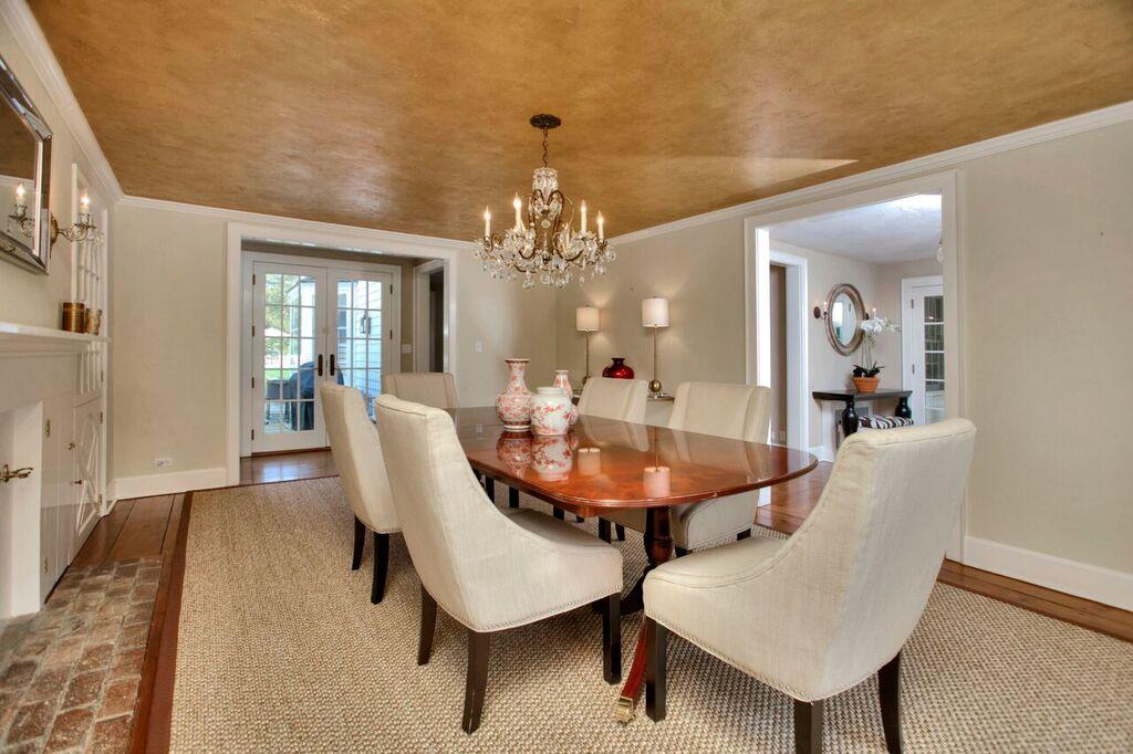 45 Ridge Acres Road Darien, CT 06820 - Photo 3 of 25 a view of a dining room with furniture and chandelier