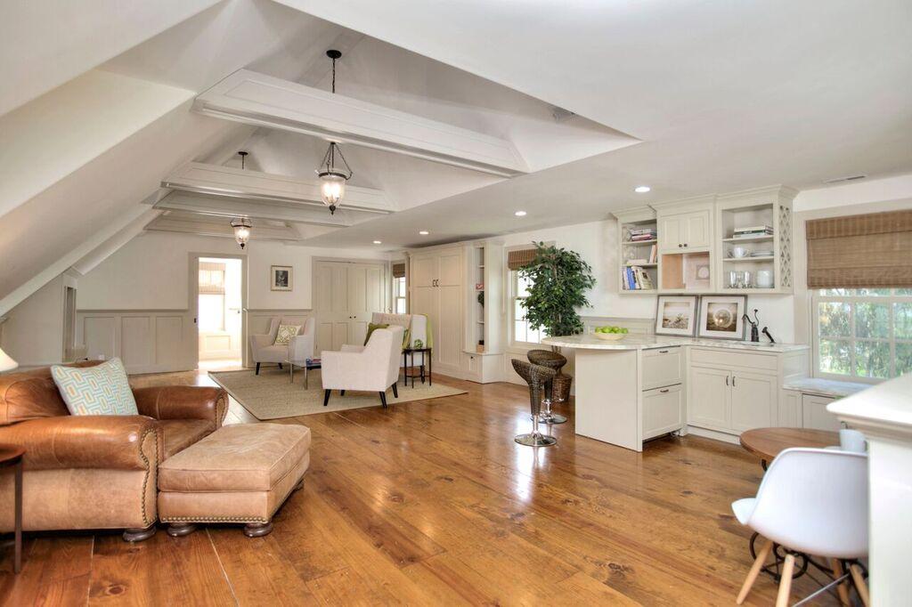 45 Ridge Acres Road Darien, CT 06820 - Photo 21 of 25 a living room with furniture and kitchen view