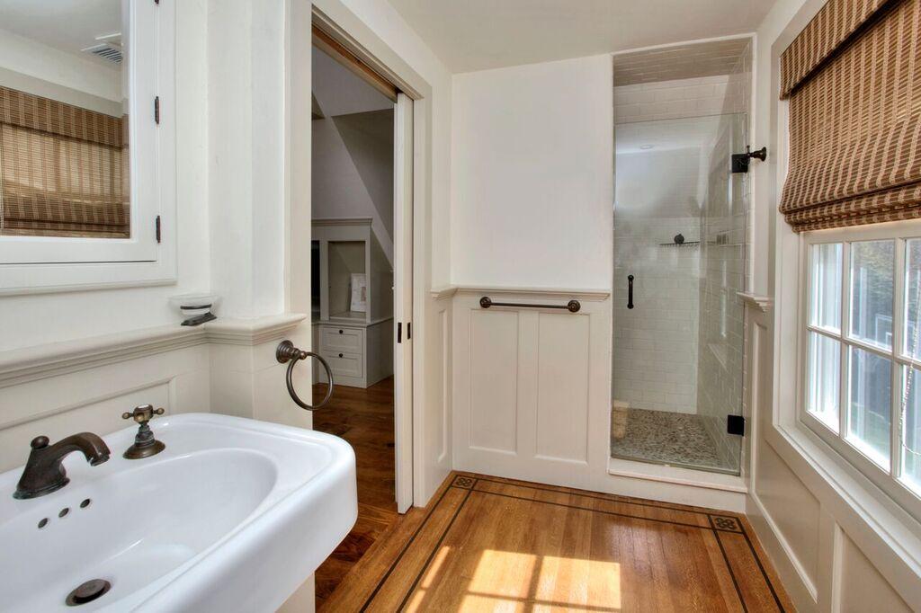 45 Ridge Acres Road Darien, CT 06820 - Photo 23 of 25 a bathroom with a sink and a bathtub