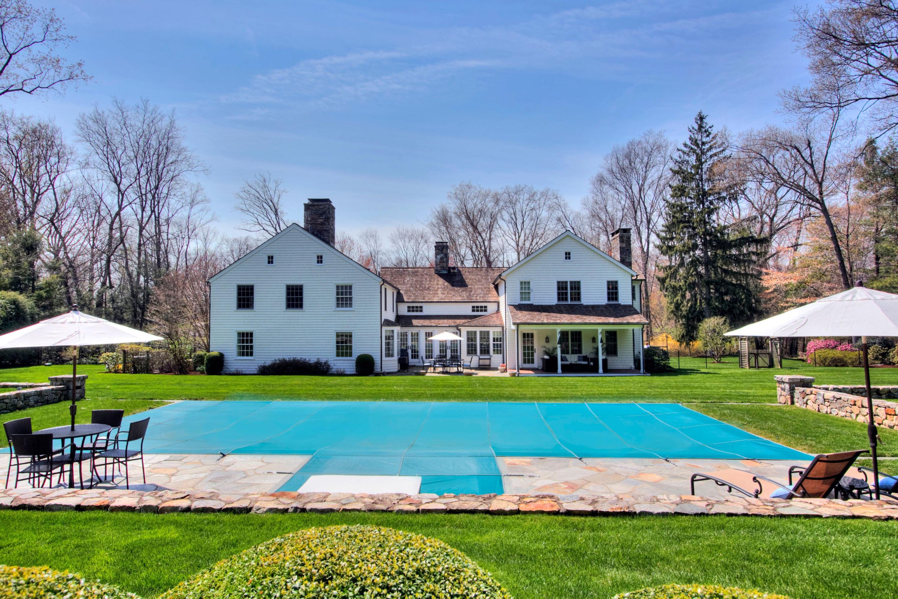 45 Ridge Acres Road Darien, CT 06820 - Photo 25 of 25 a front view of a house with garden