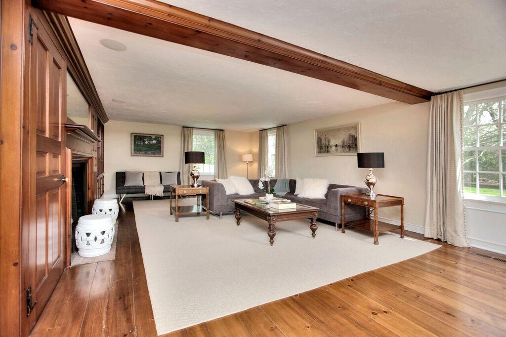 45 Ridge Acres Road Darien, CT 06820 - Photo 4 of 25 a living room with fireplace furniture and a large window