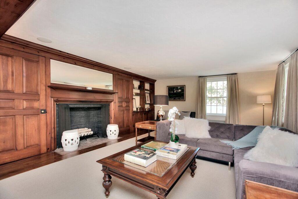 45 Ridge Acres Road Darien, CT 06820 - Photo 5 of 25 a living room with furniture a rug and a window