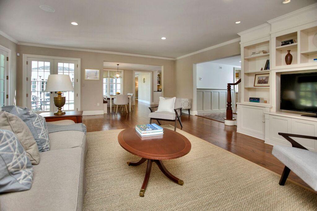 45 Ridge Acres Road Darien, CT 06820 - Photo 10 of 25 a living room with furniture and a flat screen tv