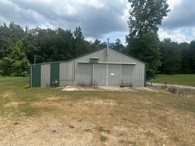 320 South Point Drive Camden, TN 38320 - Photo 1 of 62 a house with a yard in front of it