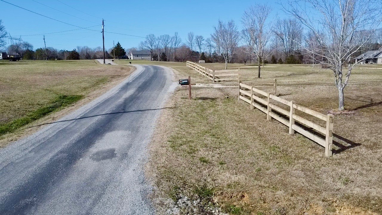 320 South Point Drive Camden, TN 38320 - Photo 39 of 62 a view of a yard with wooden fence