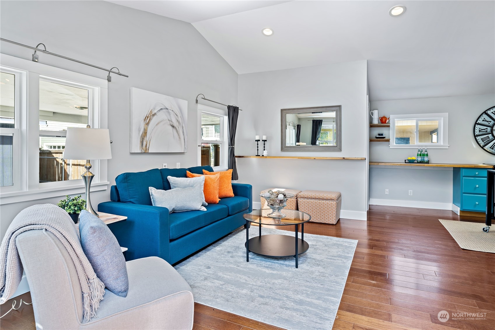 9012 7th Avenue Northwest Seattle, WA 98117 - Photo 11 of 36 a living room with fireplace furniture and a wooden floor