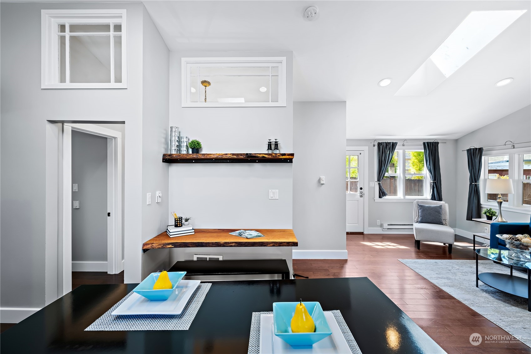 9012 7th Avenue Northwest Seattle, WA 98117 - Photo 20 of 36 a room with furniture and a wooden floor