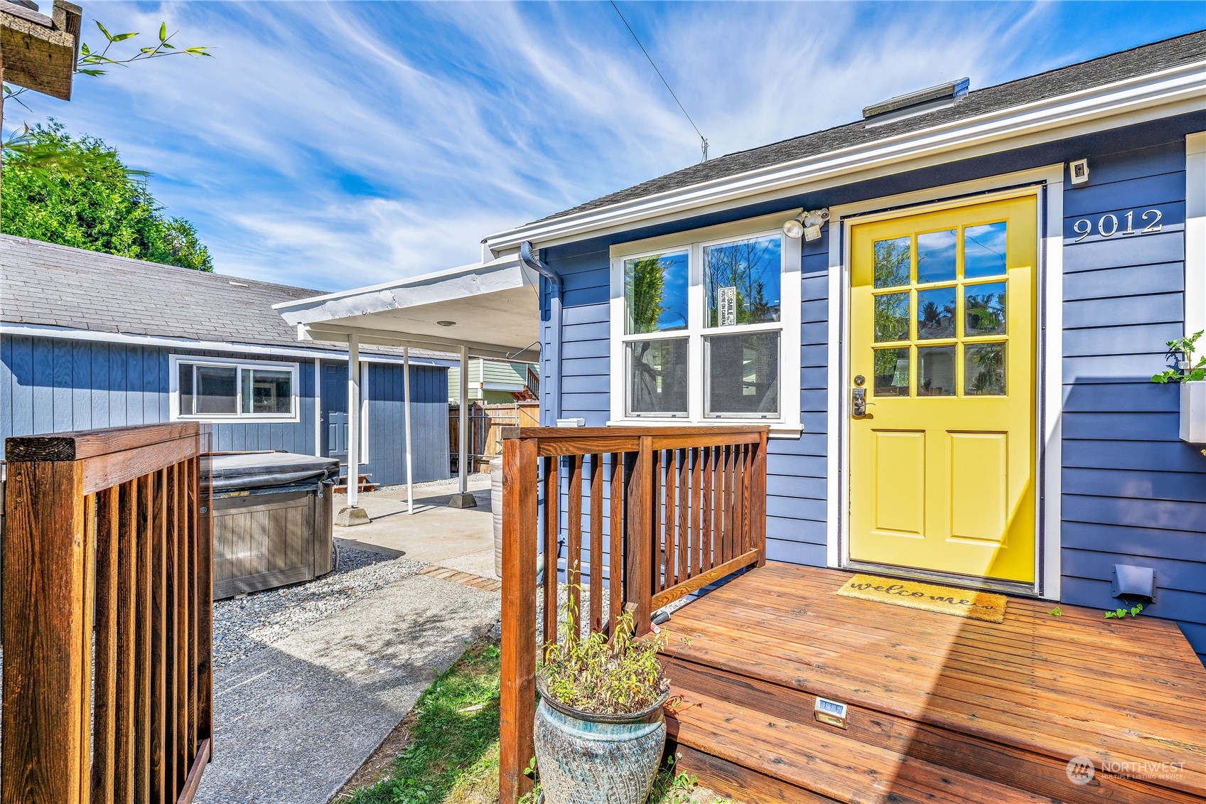 9012 7th Avenue Northwest Seattle, WA 98117 - Photo 2 of 36 a view of a house with a wooden fence