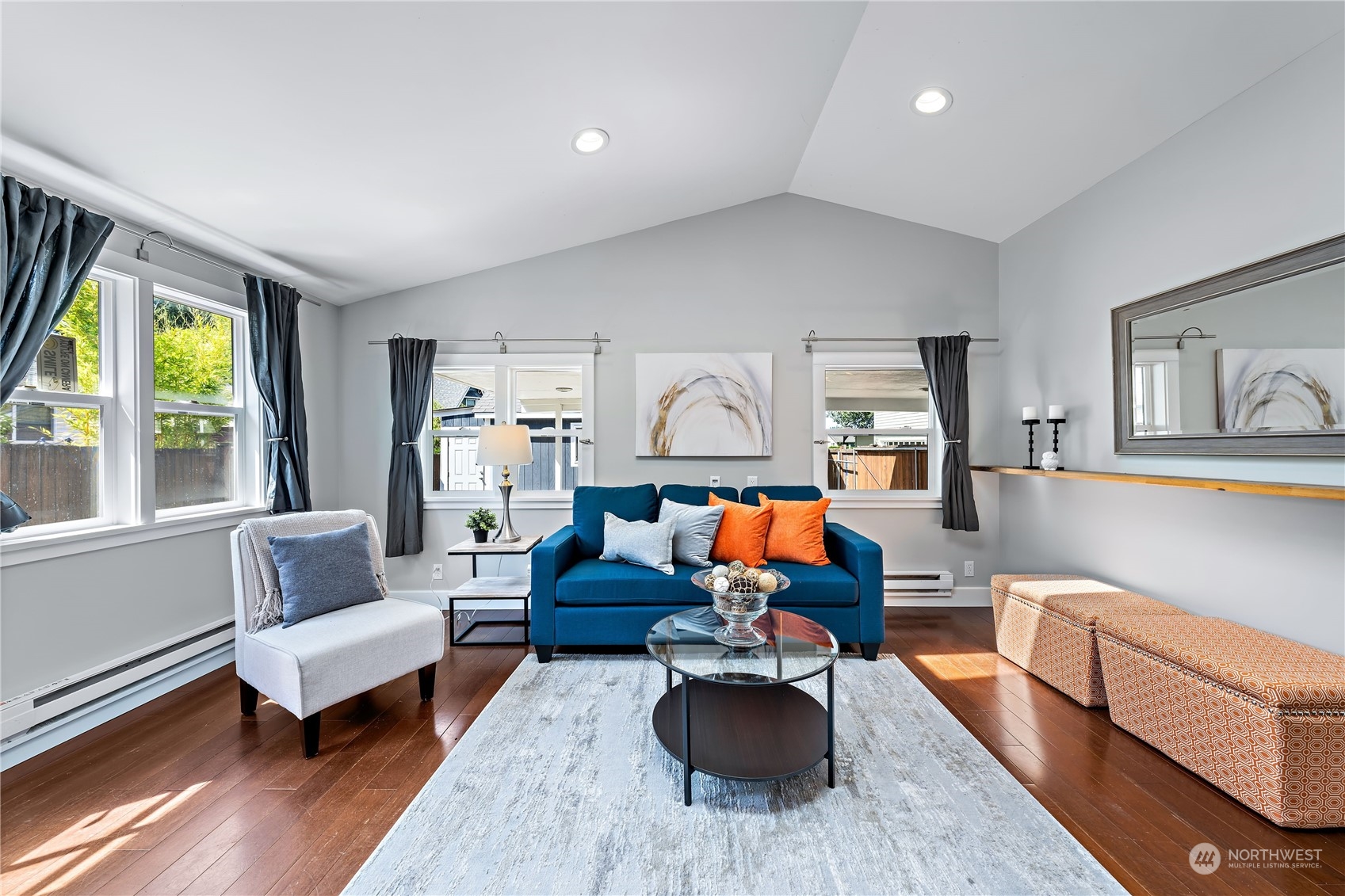 9012 7th Avenue Northwest Seattle, WA 98117 - Photo 8 of 36 a living room with furniture fireplace and a large window