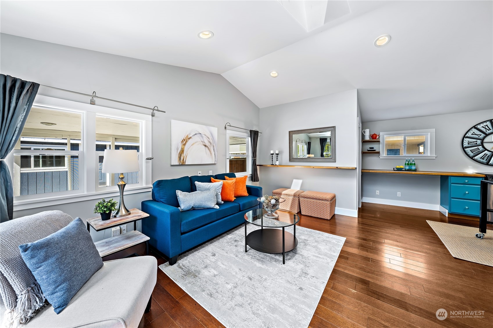 9012 7th Avenue Northwest Seattle, WA 98117 - Photo 10 of 36 a living room with furniture fireplace and flat screen tv