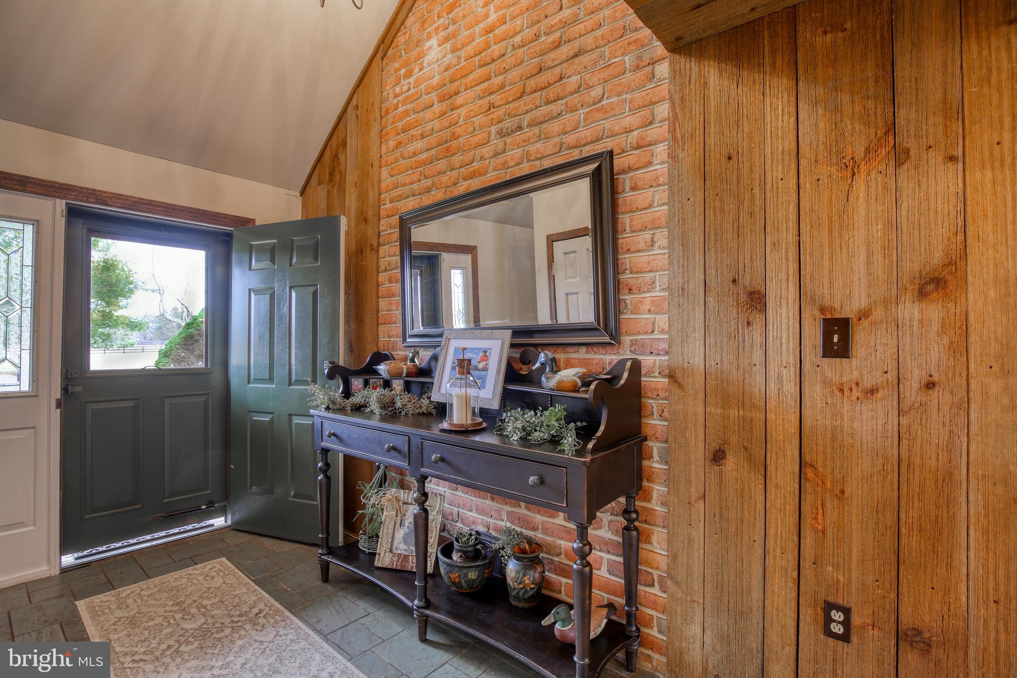 2327 Gun Barrel Road White Post, VA 22663 - Photo 6 of 69 Foyer with slate floor & exposed brick on wall