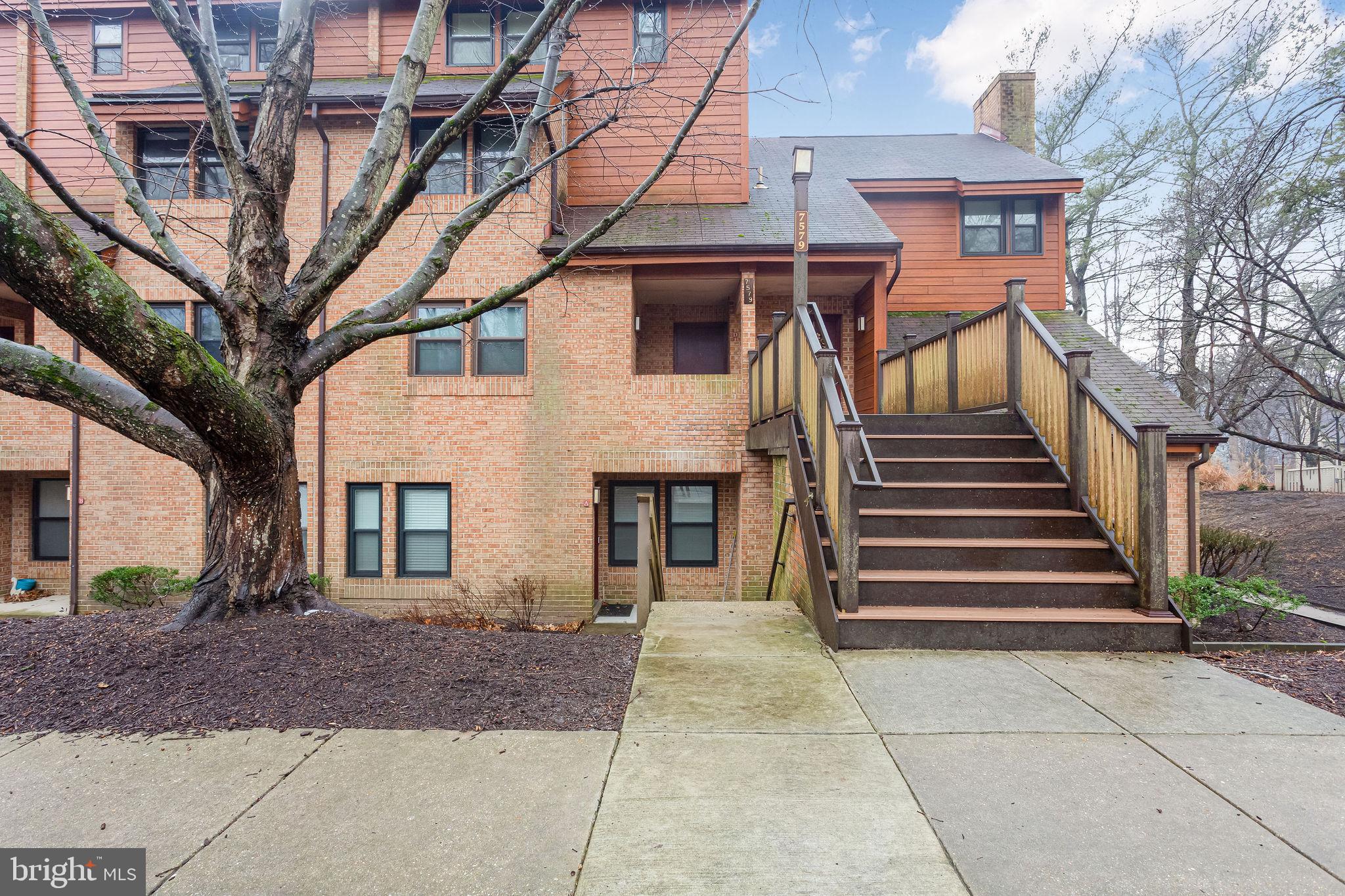 7579 Weather Worn Way, Unit D Columbia, MD 21046 - Photo 4 of 24 a front view of a house with stairs